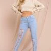 Mid Rise Extreme Distressed Skinny Jeans